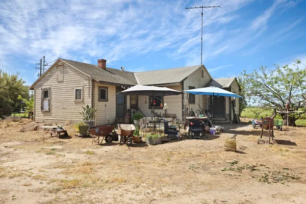 a front view of a house with a patio