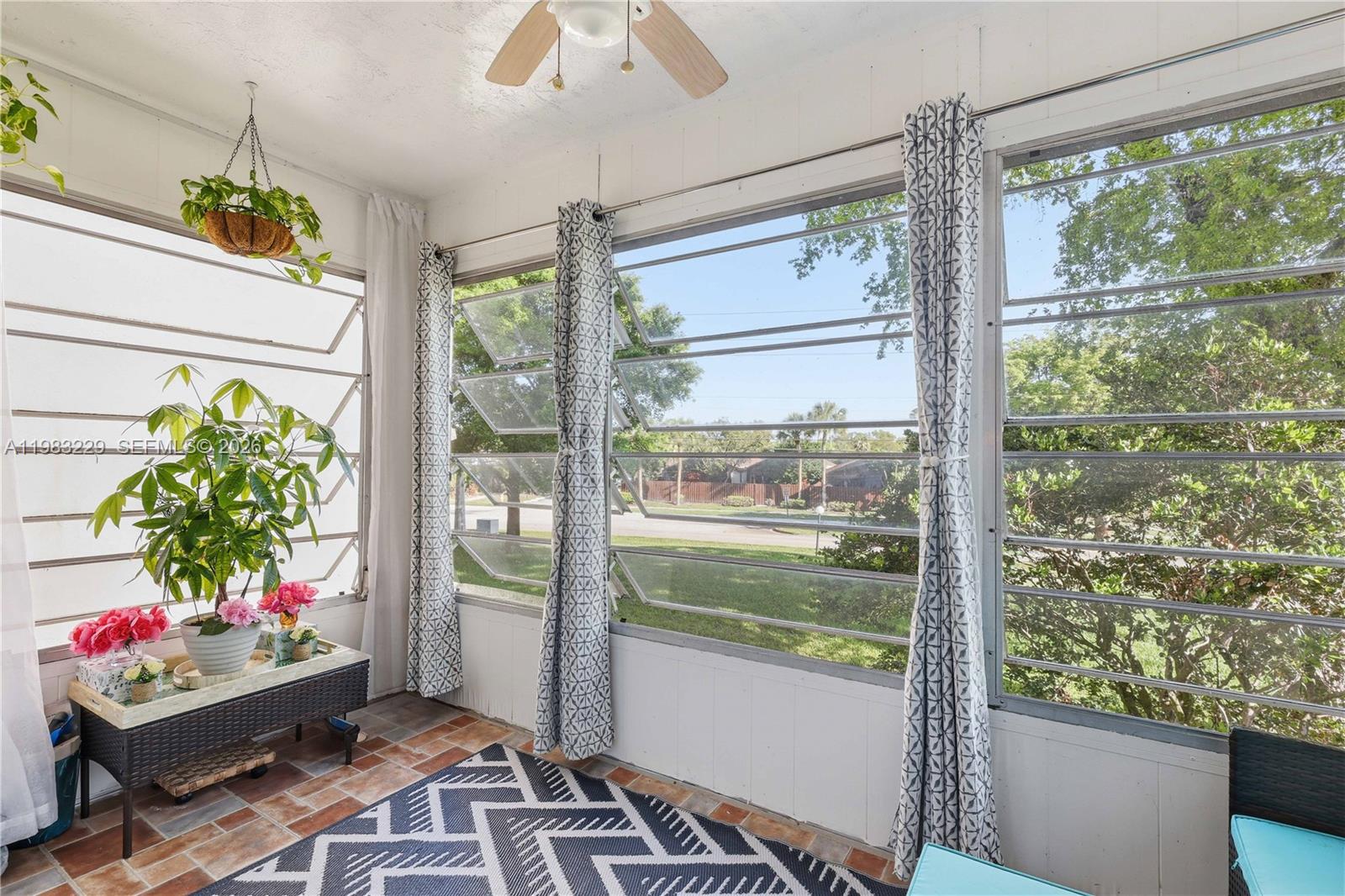 7100 Northwest 17th Street, Unit 210 Plantation, FL 33313 - Photo 6 of 15 a room with toys and a table