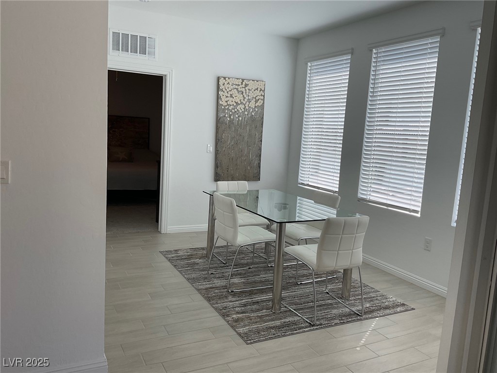 2555 Hampton Road, Unit 4209 Henderson, NV 89052 - Photo 22 of 67 Dining area with light wood finished floors and baseboards