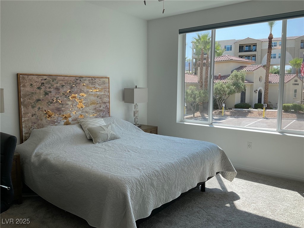 2555 Hampton Road, Unit 4209 Henderson, NV 89052 - Photo 38 of 67 Carpeted bedroom with baseboards