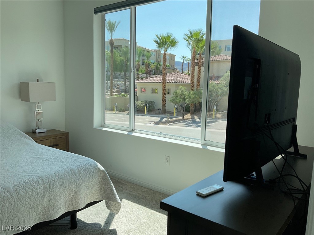 2555 Hampton Road, Unit 4209 Henderson, NV 89052 - Photo 39 of 67 Carpeted bedroom featuring baseboards