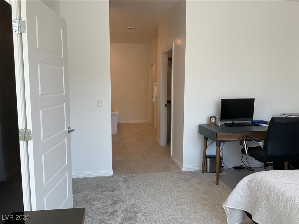 2555 Hampton Road, Unit 4209 Henderson, NV 89052 - Photo 40 of 67 Bedroom featuring an office area and light colored carpet