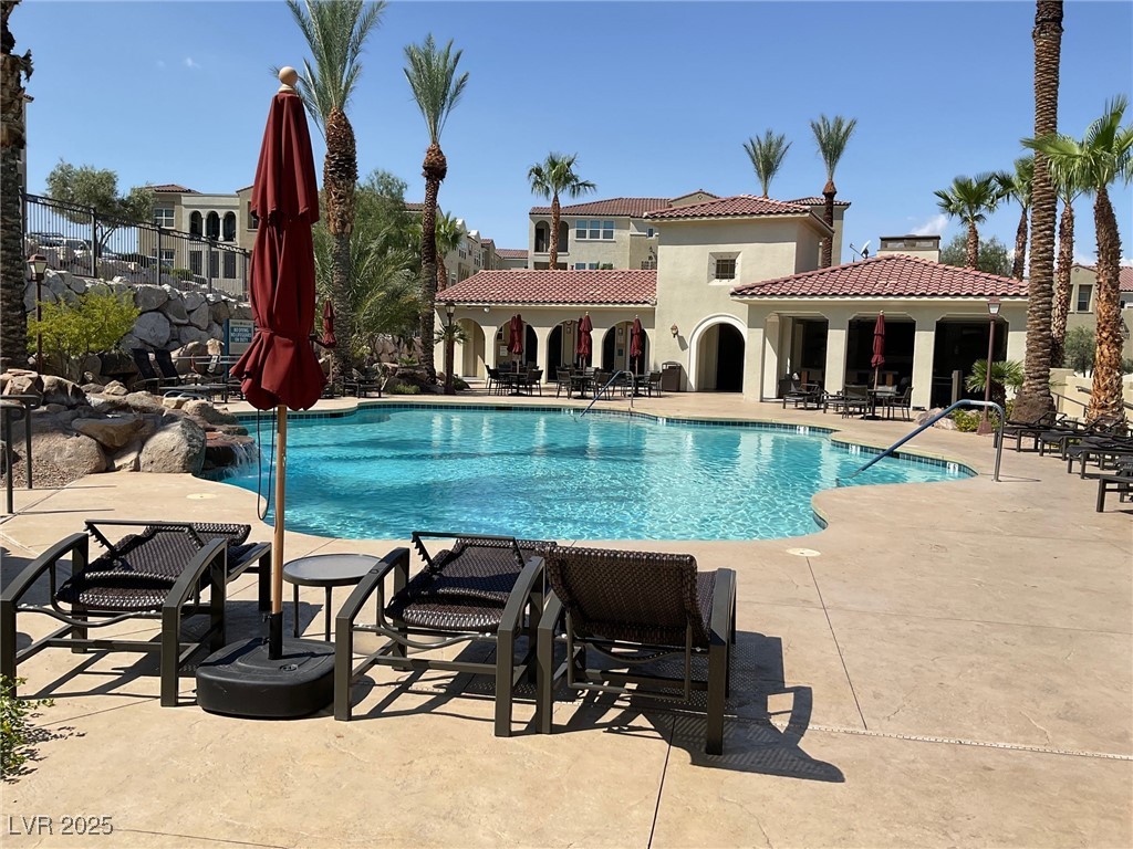 2555 Hampton Road, Unit 4209 Henderson, NV 89052 - Photo 58 of 67 Community pool with a patio
