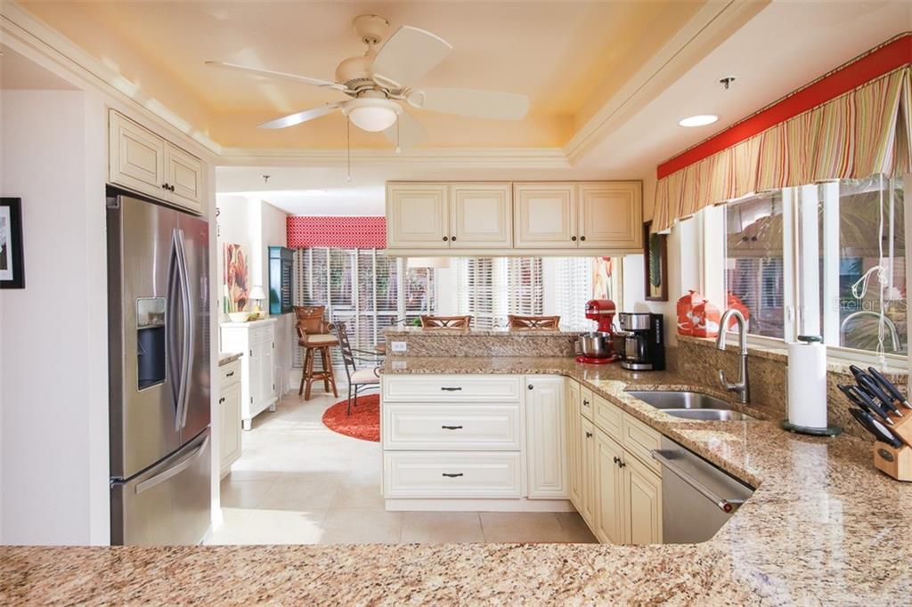 11000 Placida Road, Unit 2301 Placida, FL 33946 - Photo 8 of 39 Kitchen updated with soft close cabinetry