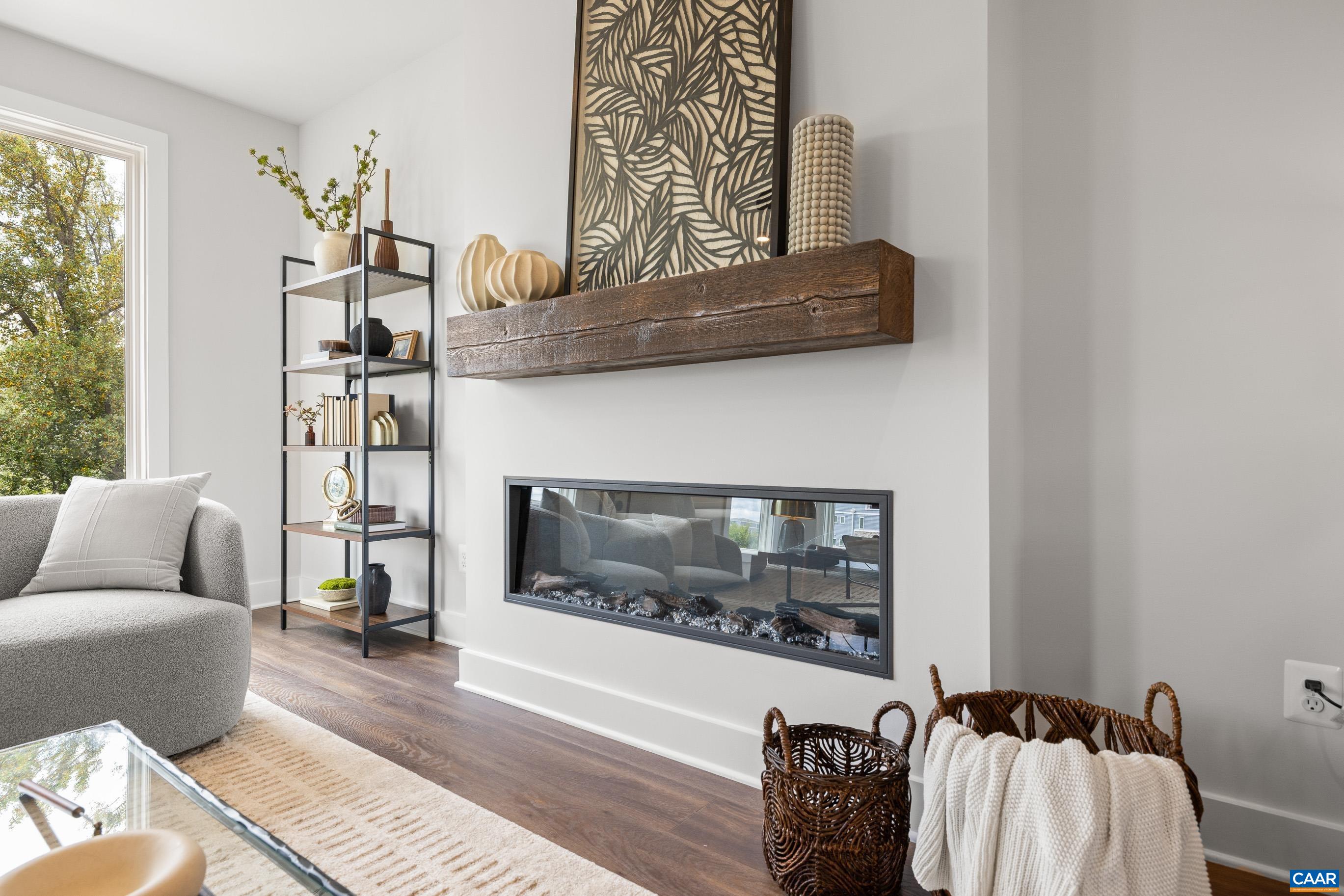 14 B Larkin Avenue Crozet, VA 22932 - Photo 11 of 40 a living room with furniture and a fireplace