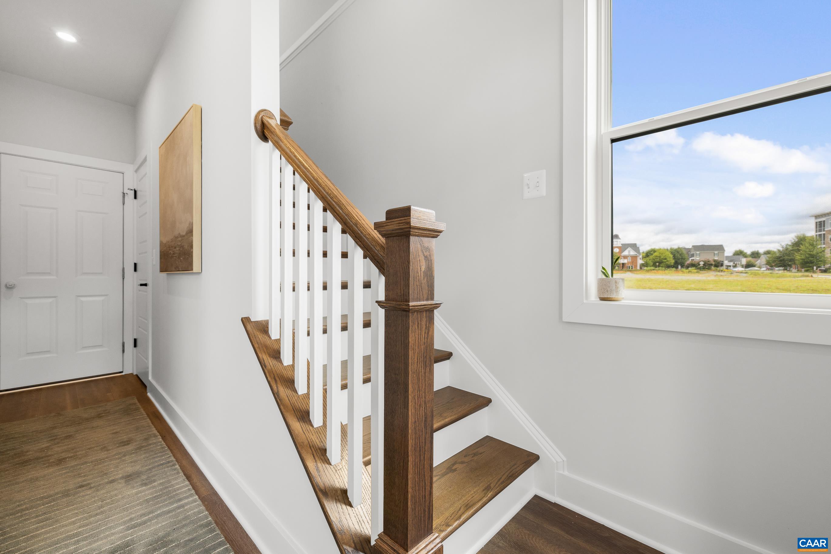 14 B Larkin Avenue Crozet, VA 22932 - Photo 7 of 40 a view of entryway with wooden floor and door