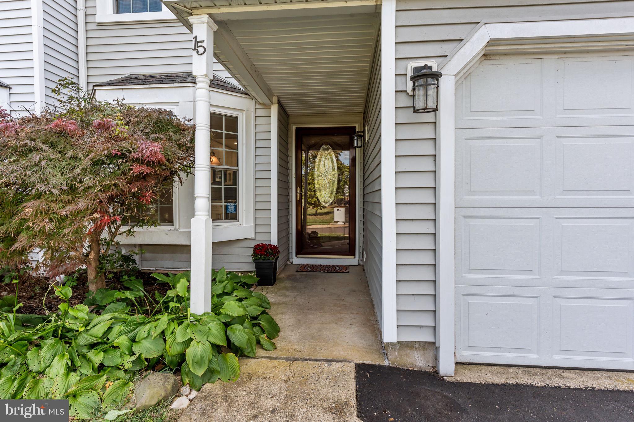 15 East Park Road Newtown, PA 18940 - Photo 2 of 35 a front view of a house with a garage