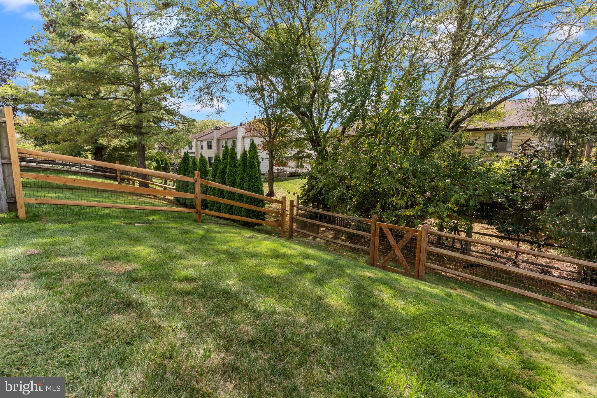 15 East Park Road Newtown, PA 18940 - Photo 28 of 35 a view of a green field with wooden fence