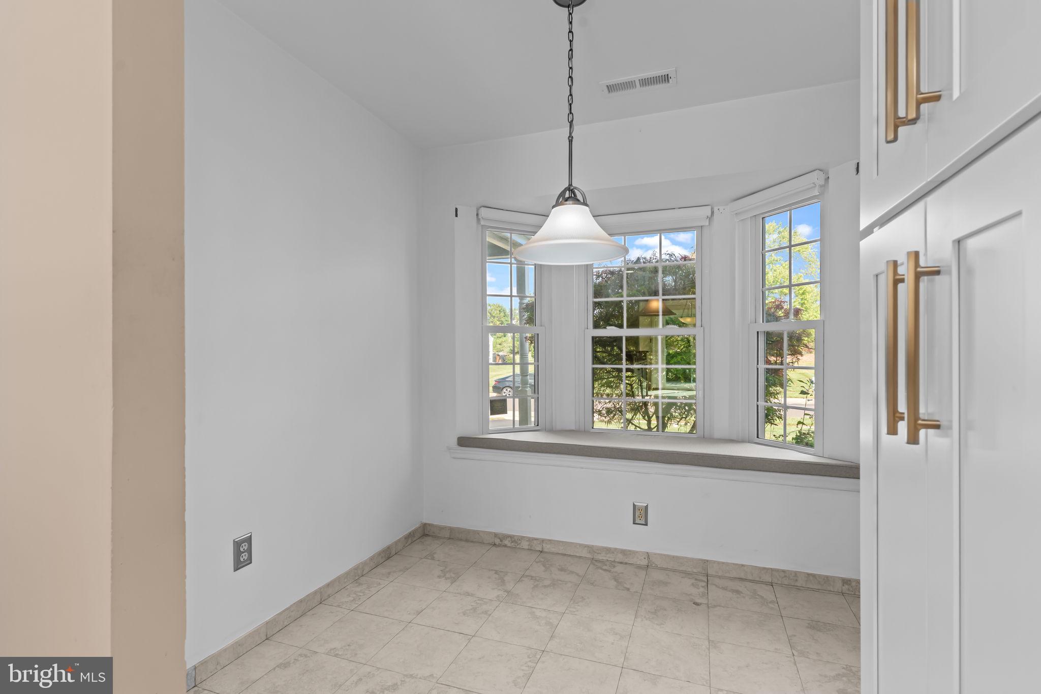 15 East Park Road Newtown, PA 18940 - Photo 7 of 35 a view of an empty room with a window