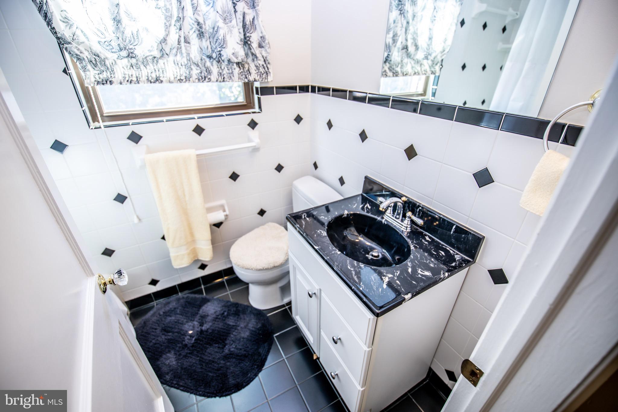 9607 Dilston Road Silver Spring, MD 20903 - Photo 21 of 39 Bathroom 1