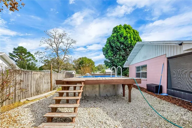 a view of a chairs and table on the wooden floor