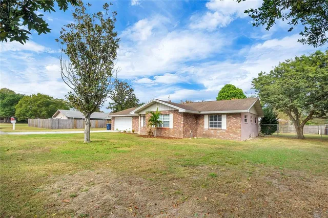 a house view with a garden space