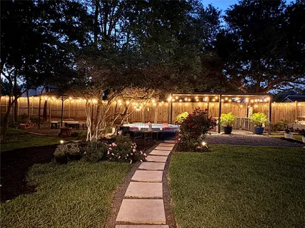 a view of a yard with patio