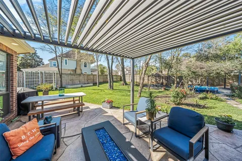 a outdoor space with patio lots of furniture and garden view