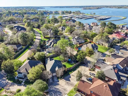 an aerial view of a houses with outdoor space