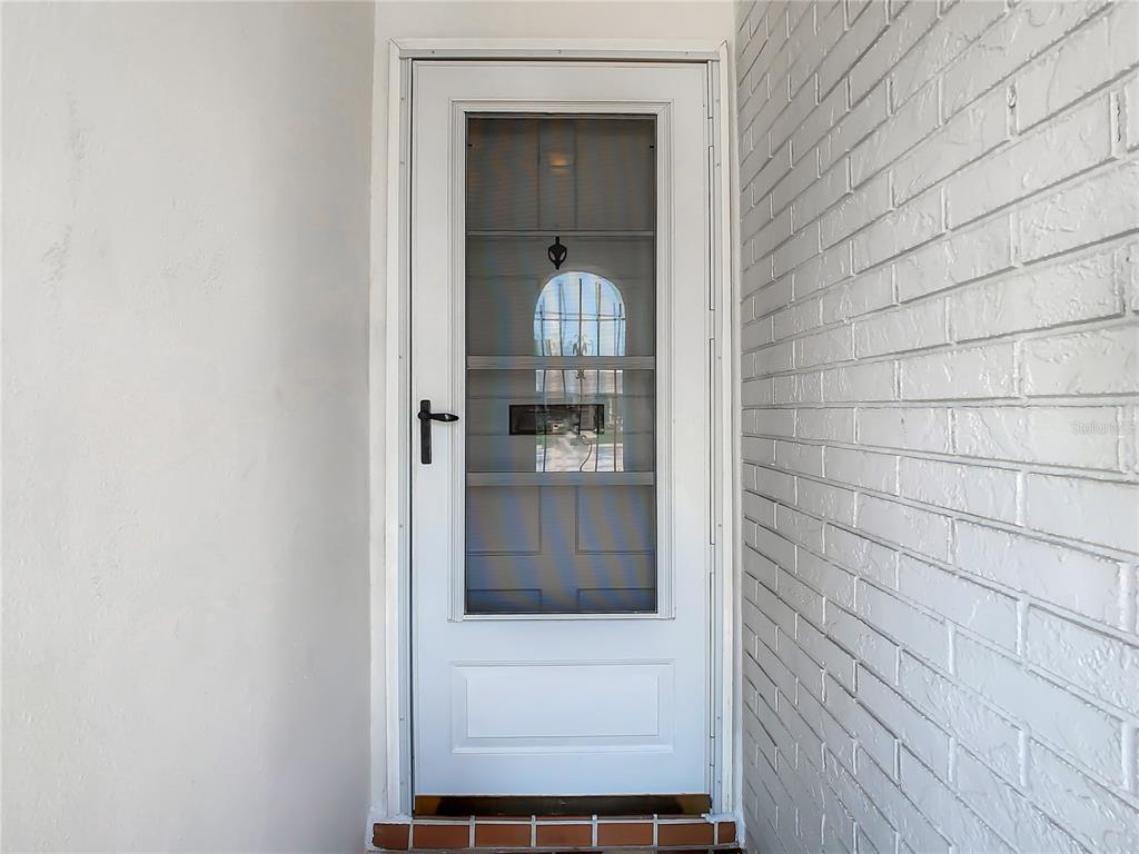 4230 Redcliff Place, Unit 4230 New Port Richey, FL 34652 - Photo 2 of 42 a view of front door