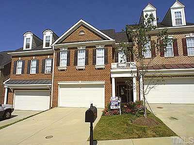 7217 Summit Waters Lane Raleigh, NC 27613 - Photo 1 of 1 a front view of a house with a yard