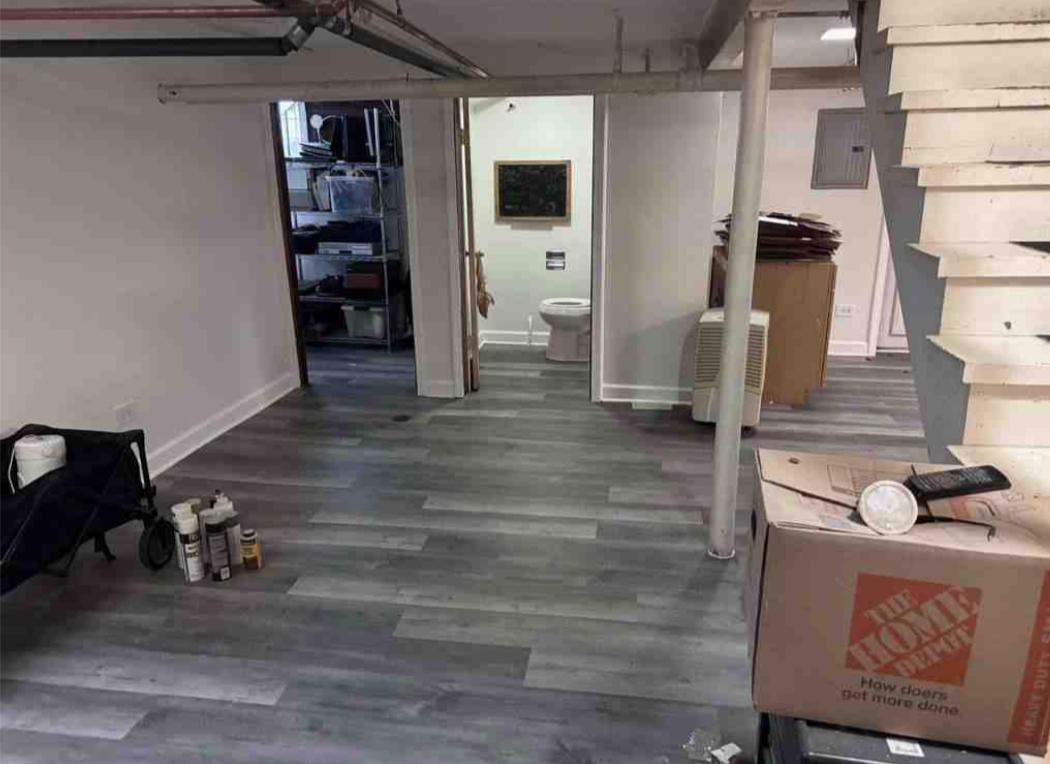 2130 West Farwell Avenue Chicago, IL 60645 - Photo 11 of 14 a view of a hallway with wooden floor and staircase