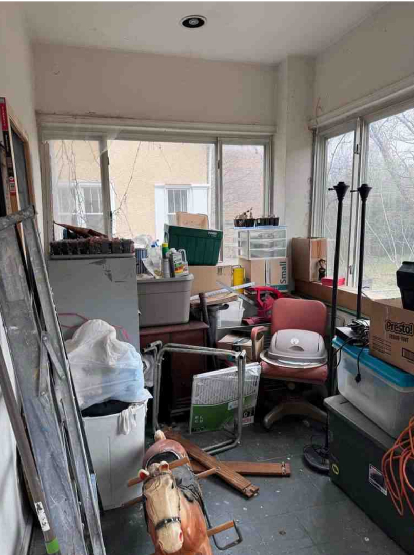 2130 West Farwell Avenue Chicago, IL 60645 - Photo 12 of 14 a living room with furniture and a large window