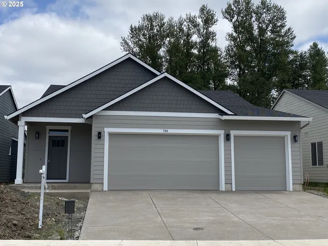 a house with trees in the background