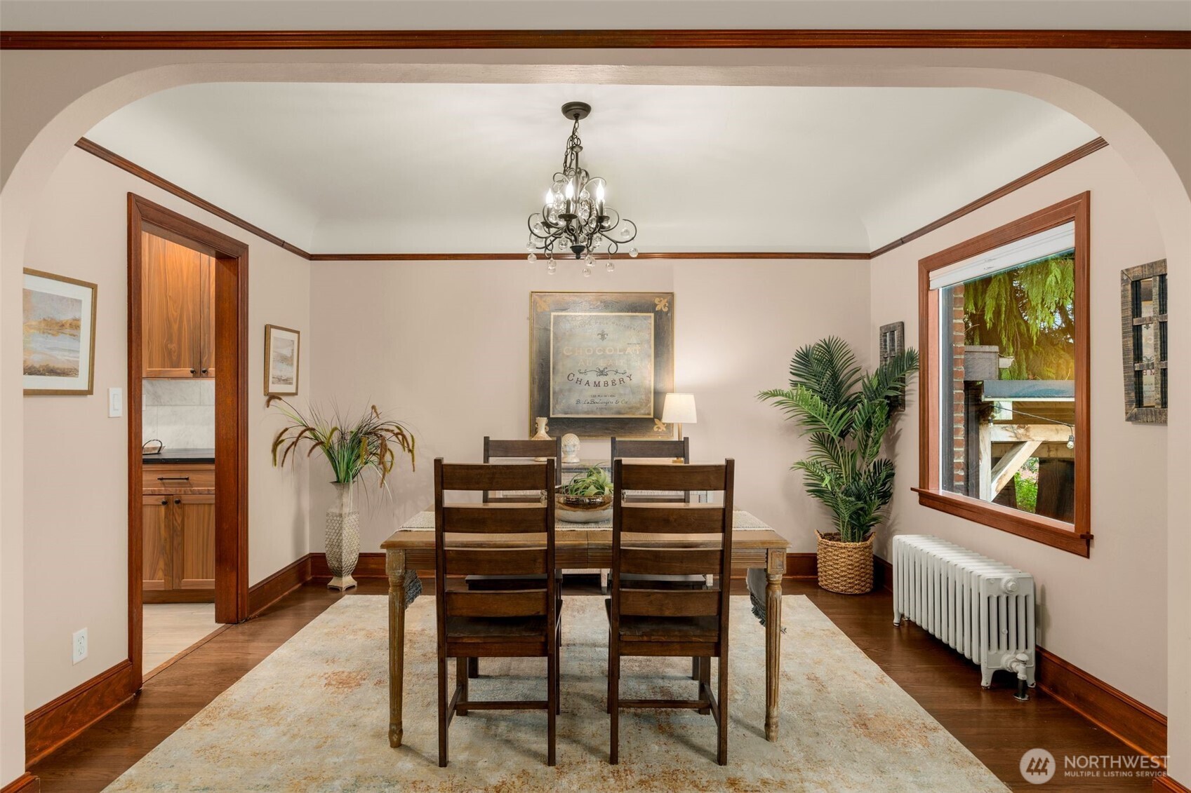 2351 47th Avenue Southwest Seattle, WA 98116 - Photo 11 of 40 a view of a dining room with furniture window and wooden floor
