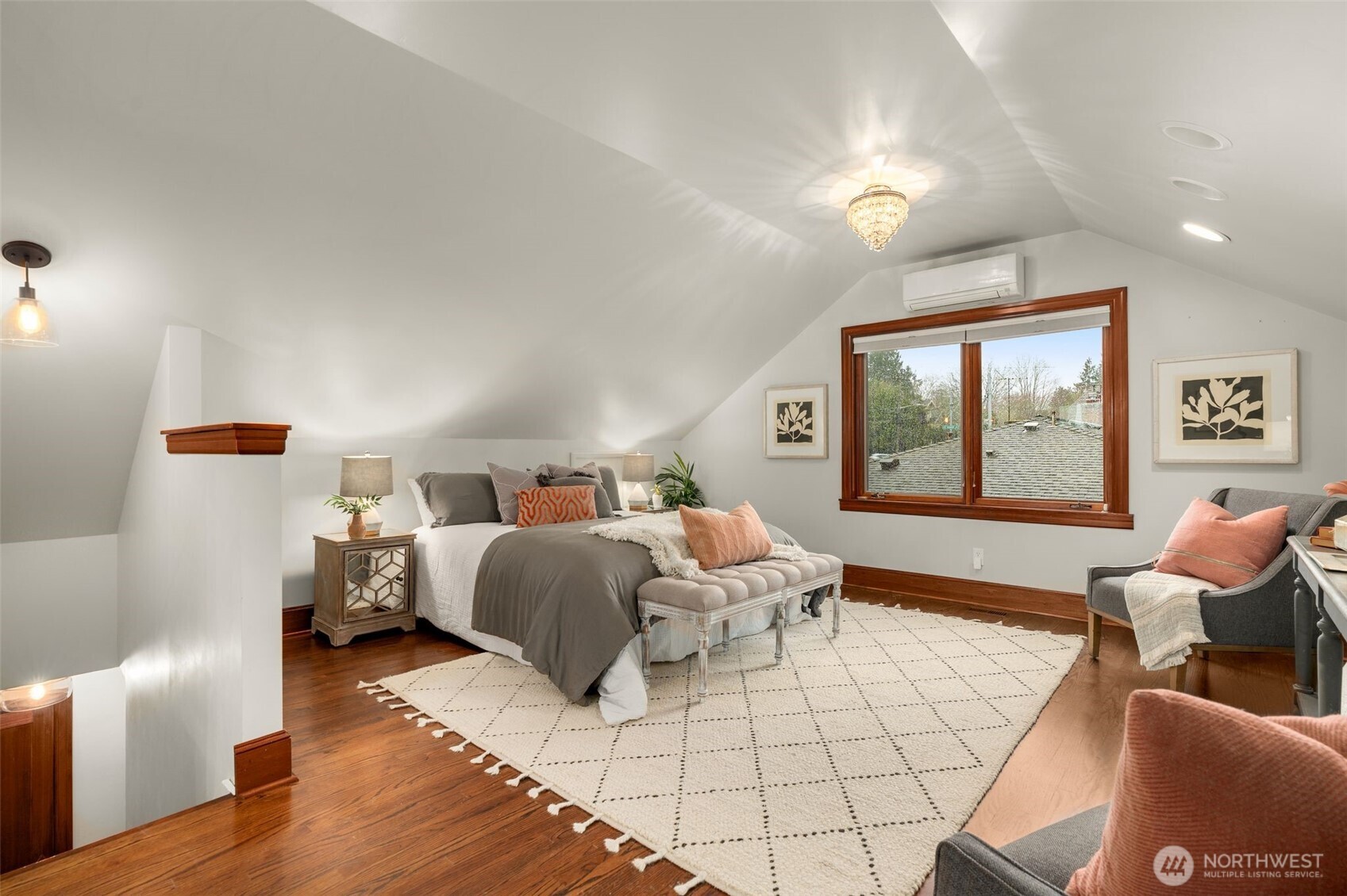 2351 47th Avenue Southwest Seattle, WA 98116 - Photo 21 of 40 a bedroom with furniture and a large window