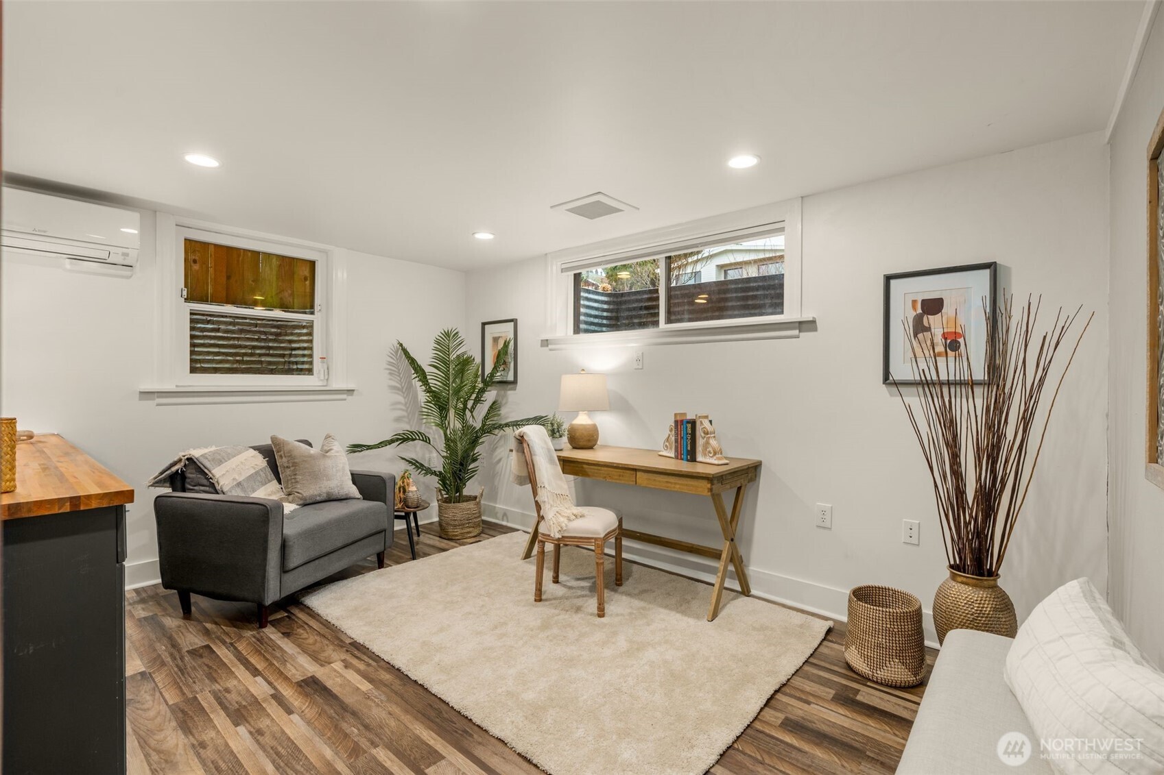 2351 47th Avenue Southwest Seattle, WA 98116 - Photo 29 of 40 a living room with furniture and a painting on the wall