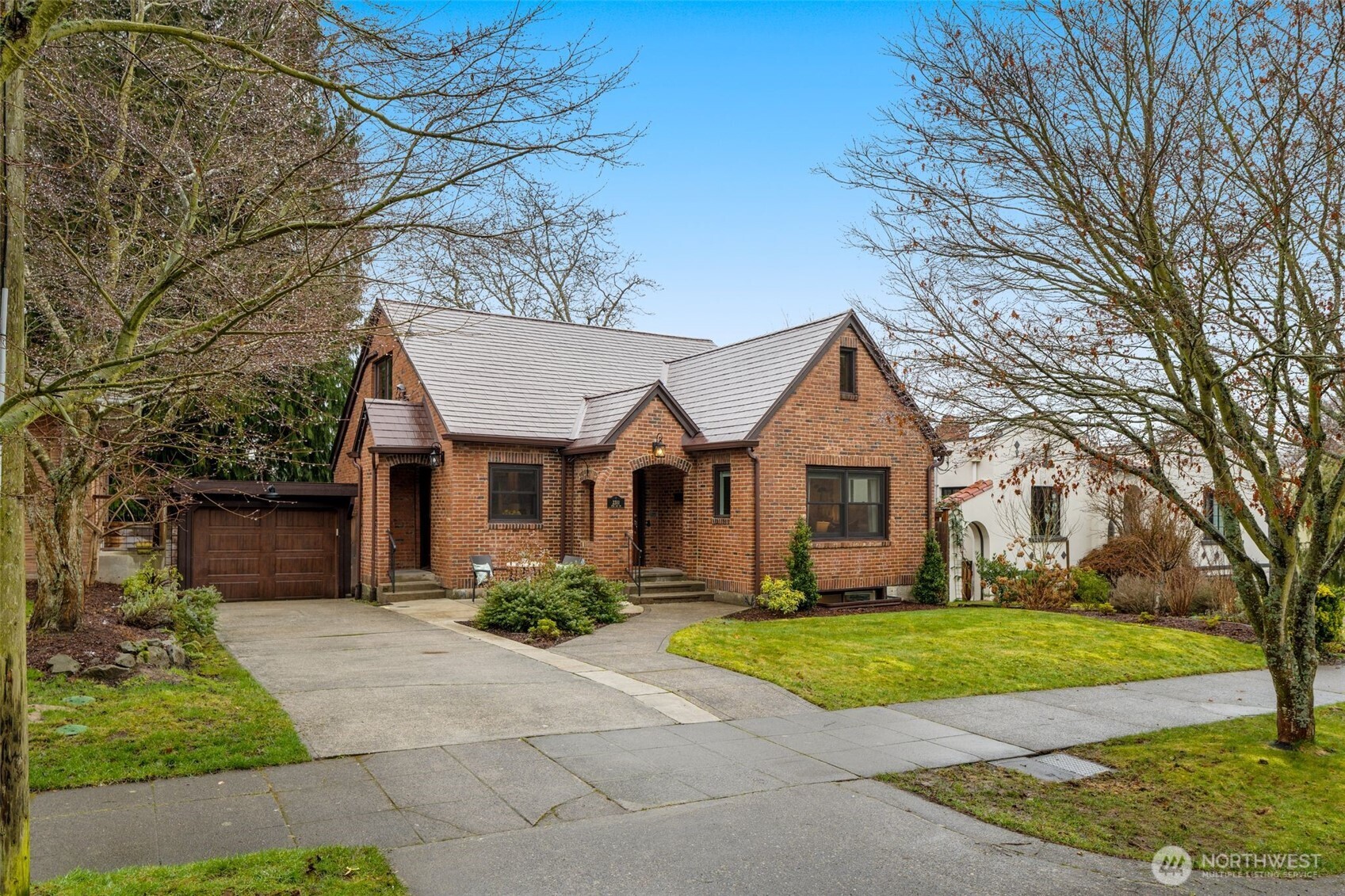 2351 47th Avenue Southwest Seattle, WA 98116 - Photo 3 of 40 a front view of house with yard and green space