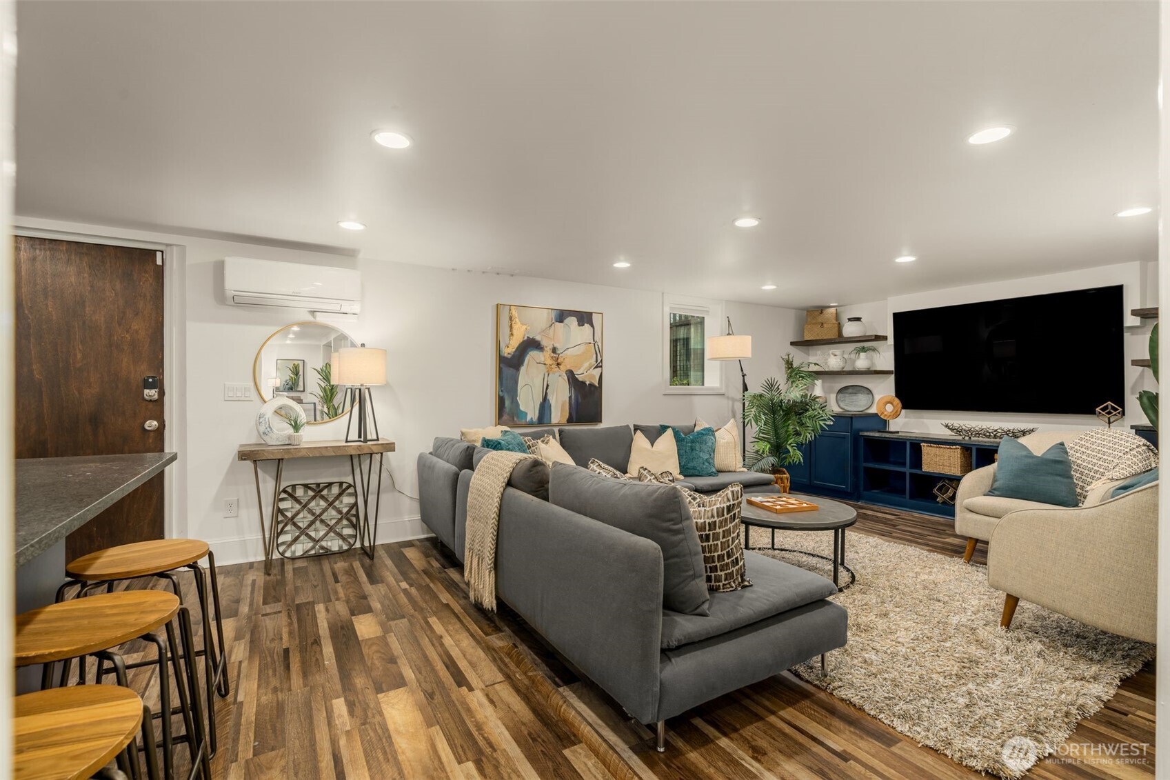 2351 47th Avenue Southwest Seattle, WA 98116 - Photo 33 of 40 a living room with furniture and a flat screen tv
