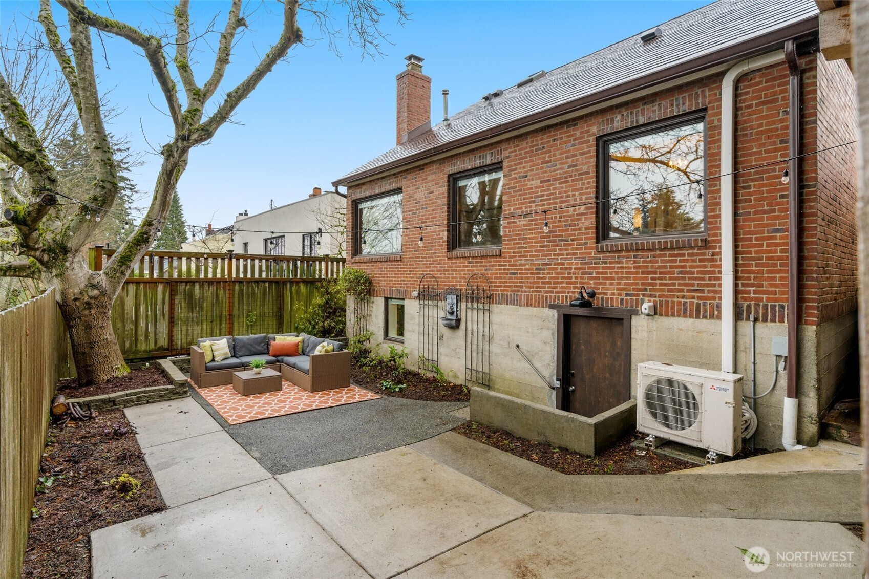 2351 47th Avenue Southwest Seattle, WA 98116 - Photo 35 of 40 a view of a patio with a table and chairs