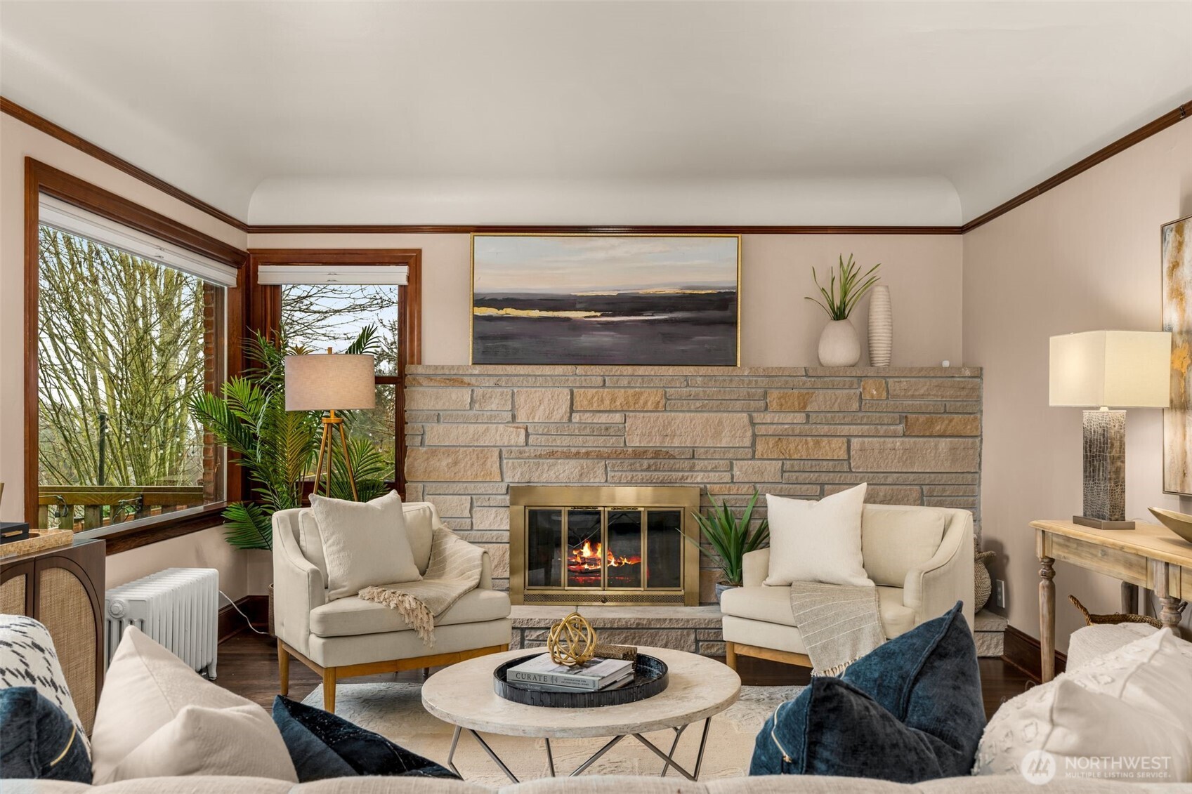 2351 47th Avenue Southwest Seattle, WA 98116 - Photo 9 of 40 a living room with furniture and a fireplace