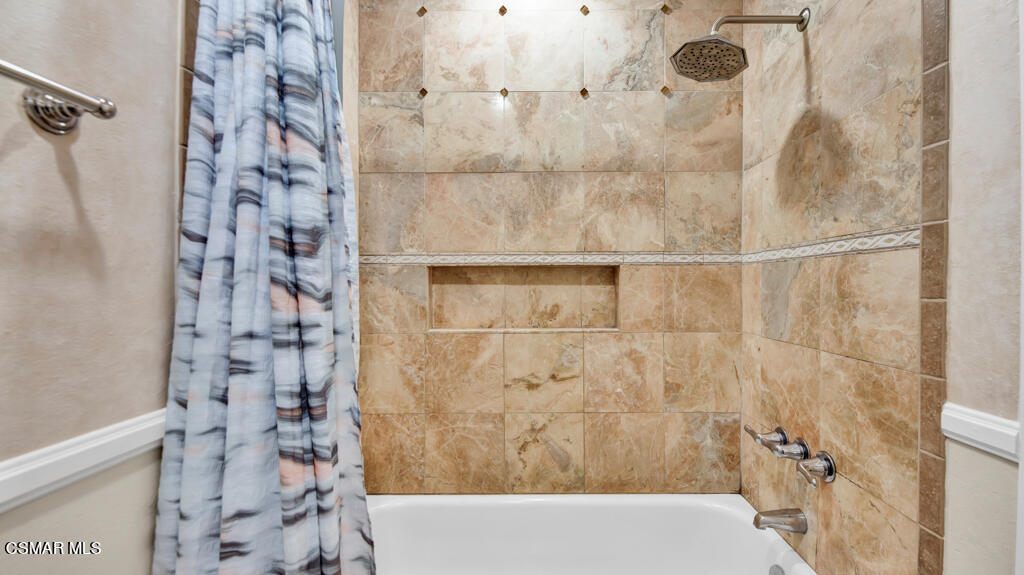 1712 Sinaloa Road, Unit 106 Simi Valley, CA 93065 - Photo 13 of 30 a bathroom with a shower