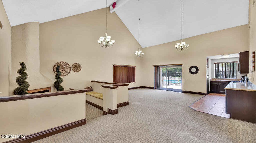 1712 Sinaloa Road, Unit 106 Simi Valley, CA 93065 - Photo 23 of 30 a view of a livingroom with furniture and a window