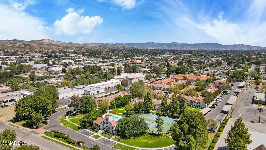 1712 Sinaloa Road, Unit 106 Simi Valley, CA 93065 - Photo 28 of 30 an aerial view of residential houses with outdoor space and trees