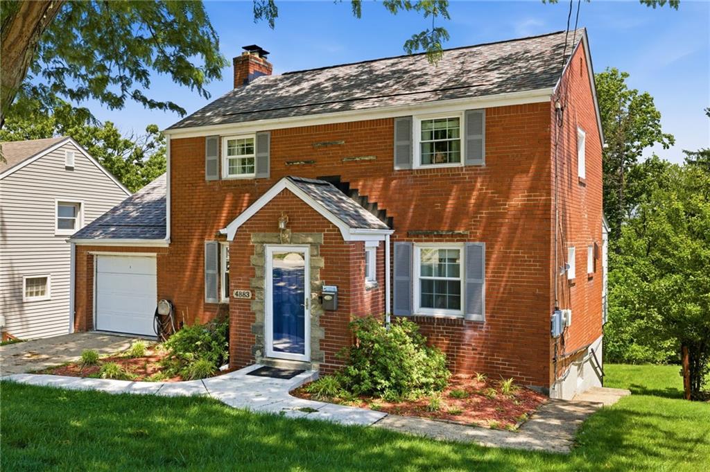 4883 East Willock Road Pittsburgh, PA 15227 - Photo 2 of 33 front view of a house with a yard