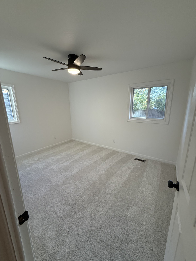 1309 Maplepark Drive Champaign, IL 61821 - Photo 14 of 24 an empty room with a window