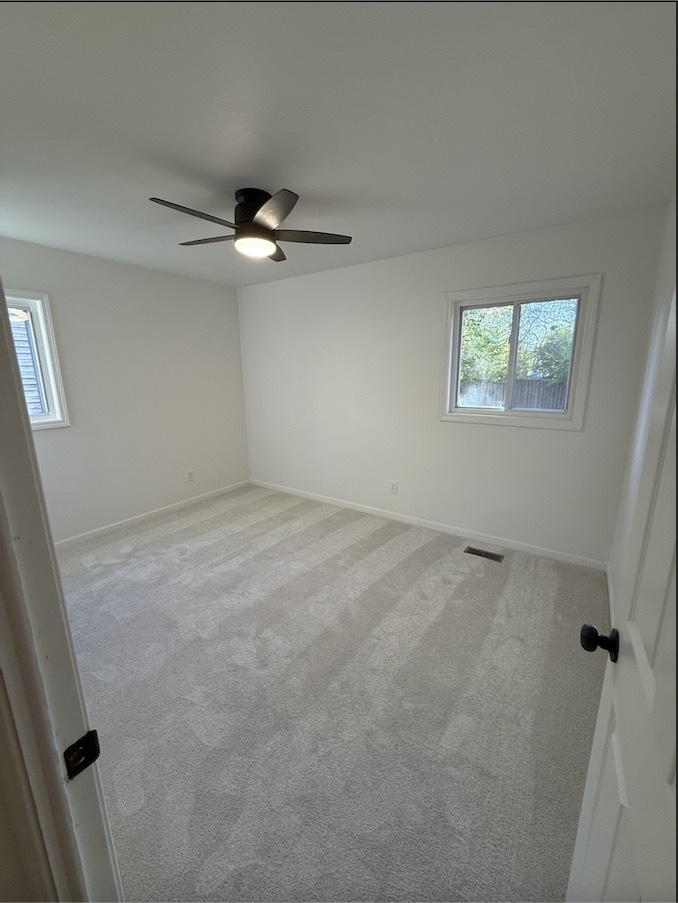 1309 Maplepark Drive Champaign, IL 61821 - Photo 15 of 24 an empty room with a window