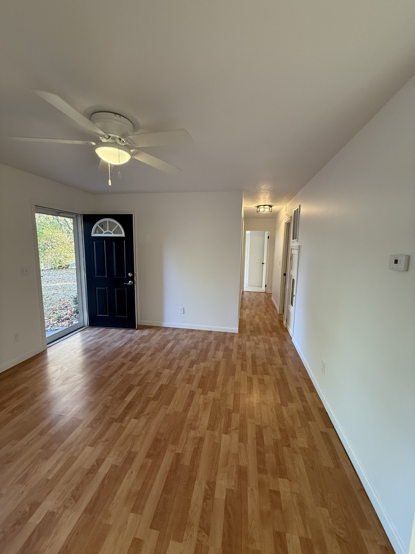 1309 Maplepark Drive Champaign, IL 61821 - Photo 2 of 24 a view of empty room with wooden floor
