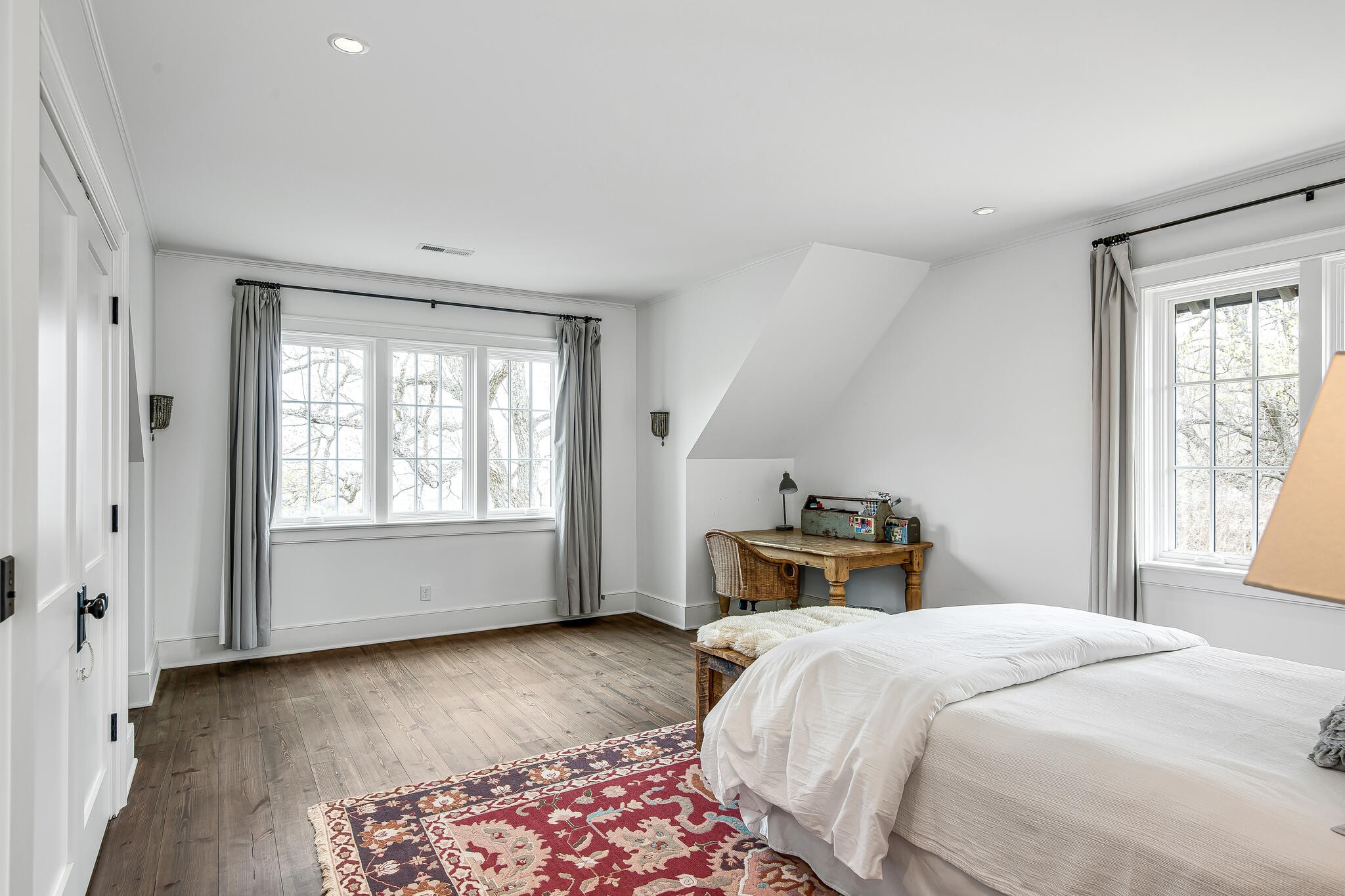 1801 Laurel Ridge Drive Nashville, TN 37215 - Photo 33 of 65 a bedroom with a large bed and wooden floor