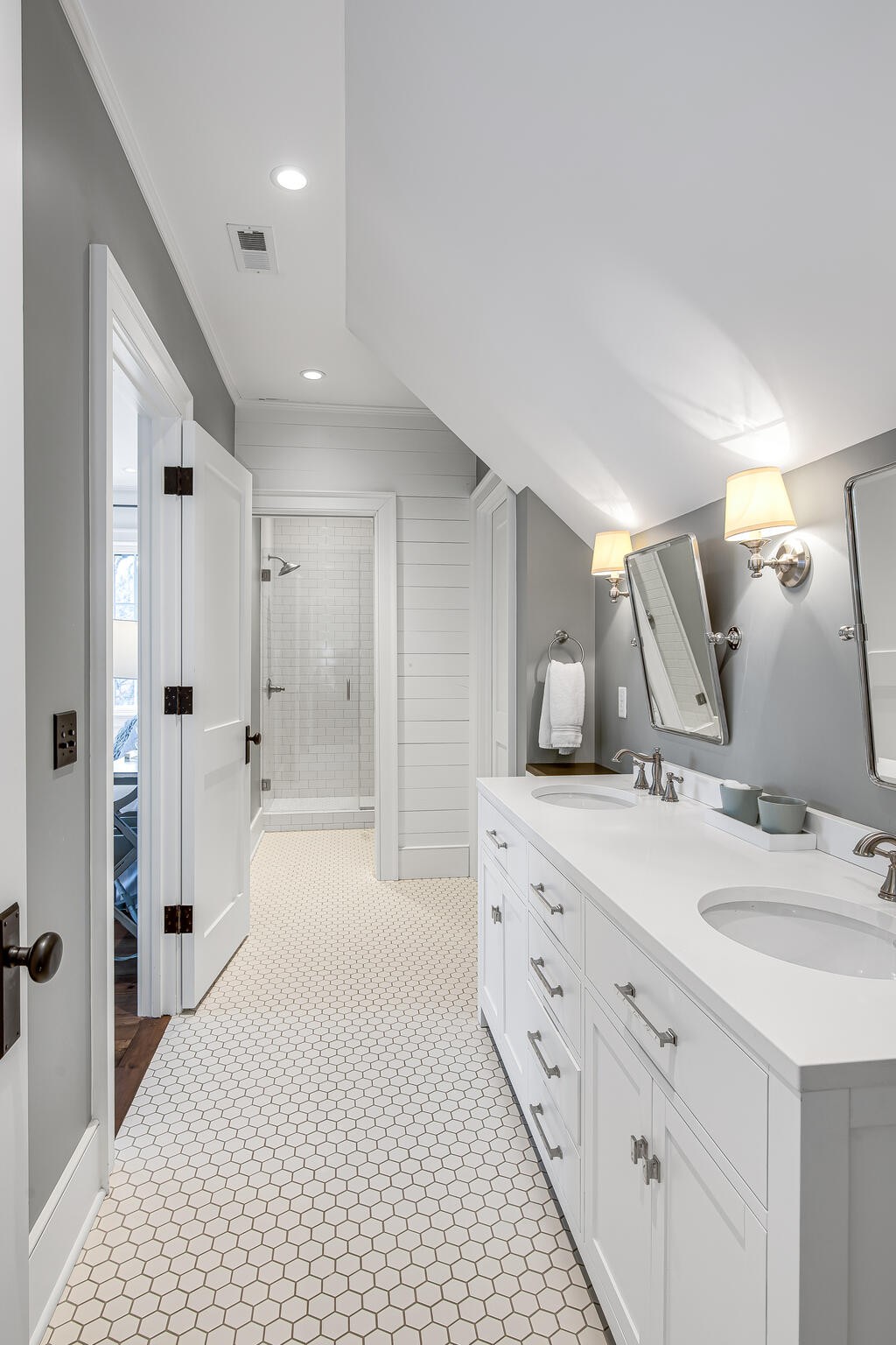 1801 Laurel Ridge Drive Nashville, TN 37215 - Photo 34 of 65 a bathroom with a double vanity sink a mirror and shower