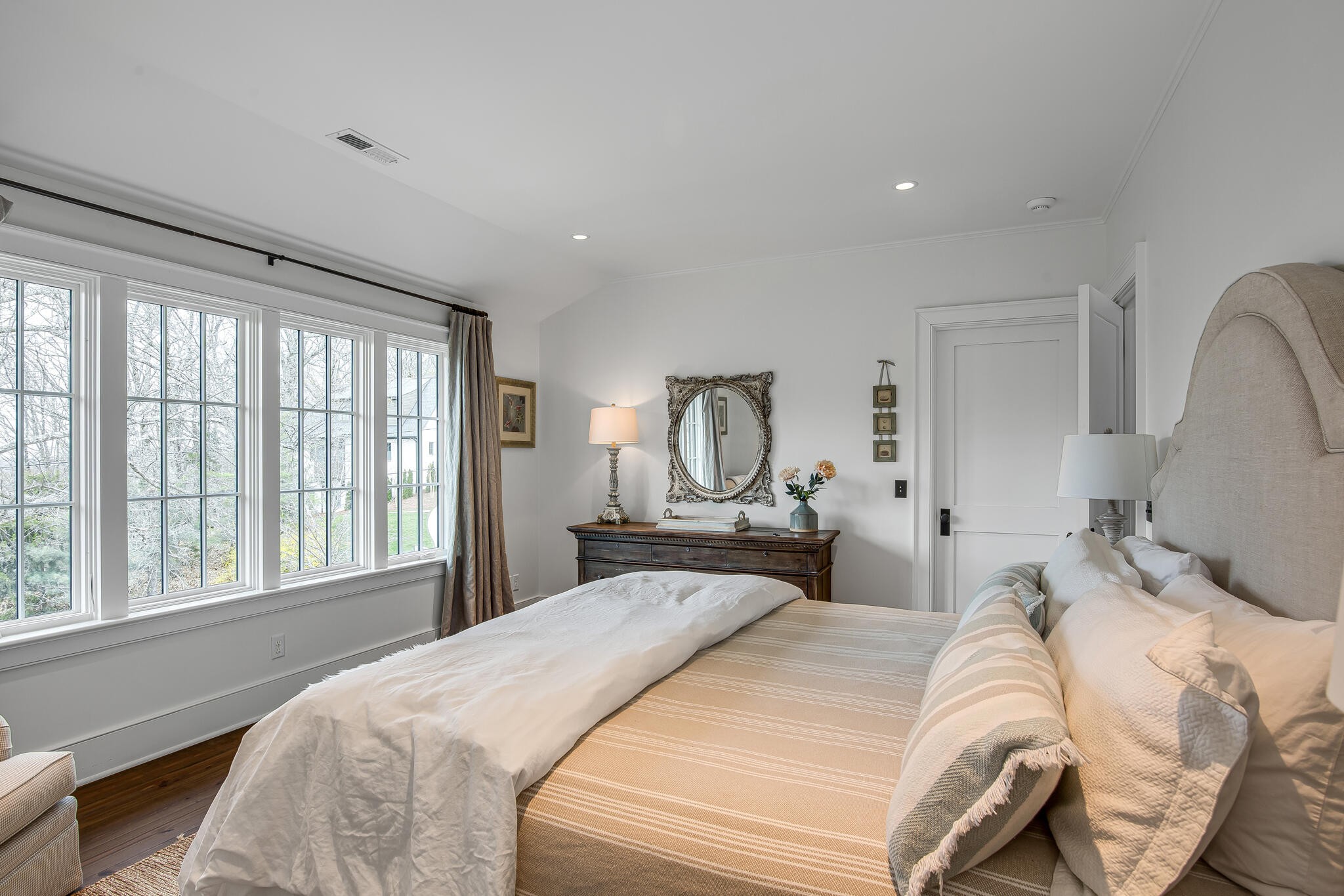 1801 Laurel Ridge Drive Nashville, TN 37215 - Photo 35 of 65 a bed sitting in a bedroom next to a window