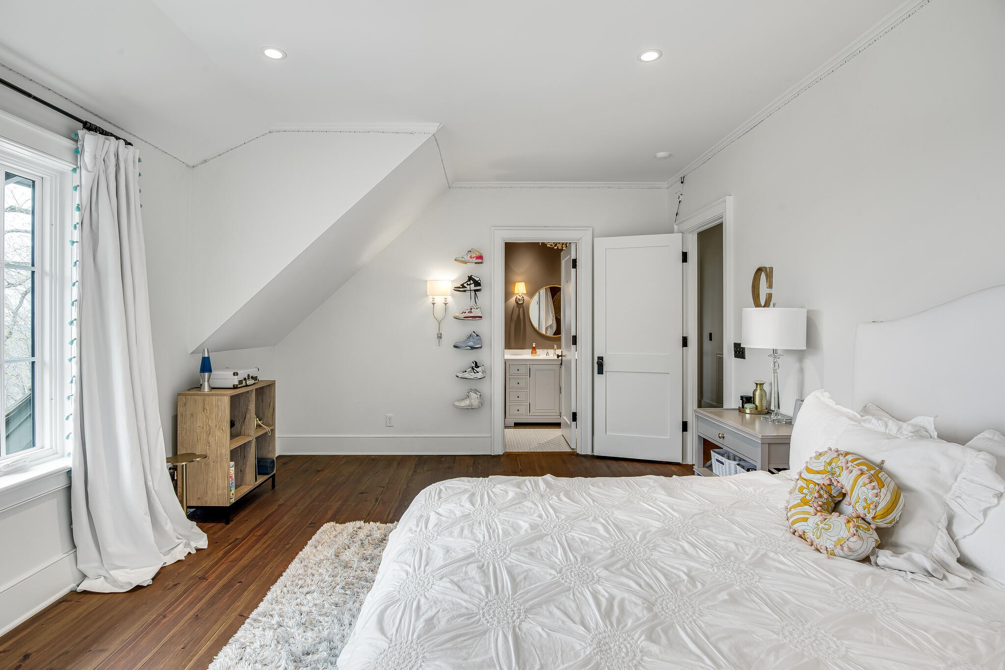 1801 Laurel Ridge Drive Nashville, TN 37215 - Photo 41 of 65 a bedroom with a bed and wooden floor