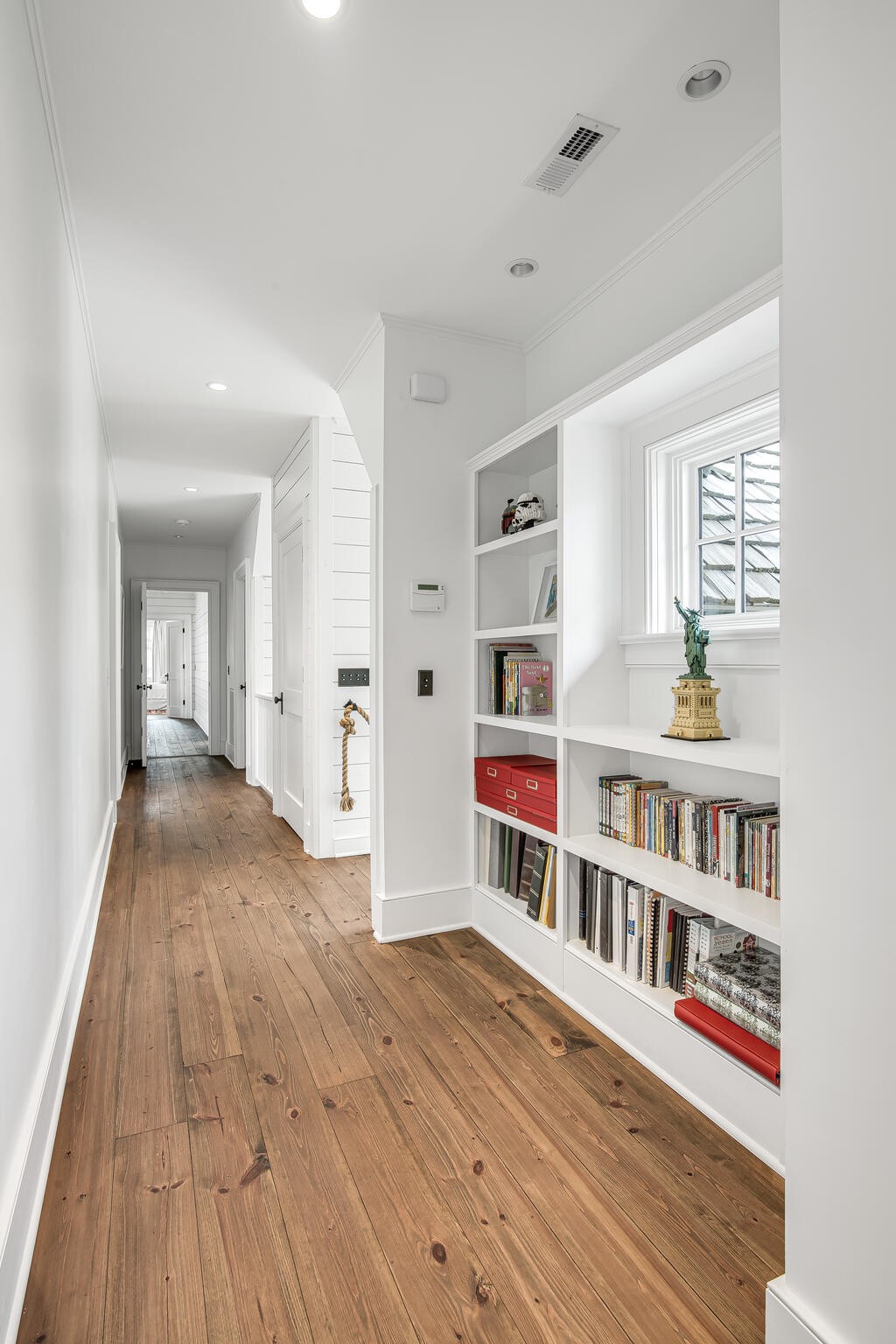 1801 Laurel Ridge Drive Nashville, TN 37215 - Photo 45 of 65 a view of a hallway with wooden floor and windows