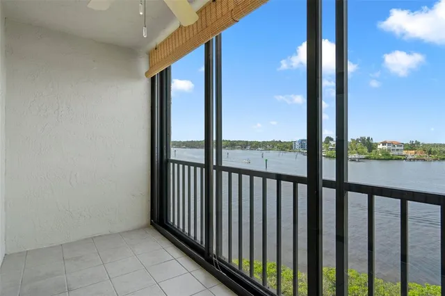 a view of walk in closet with clothes