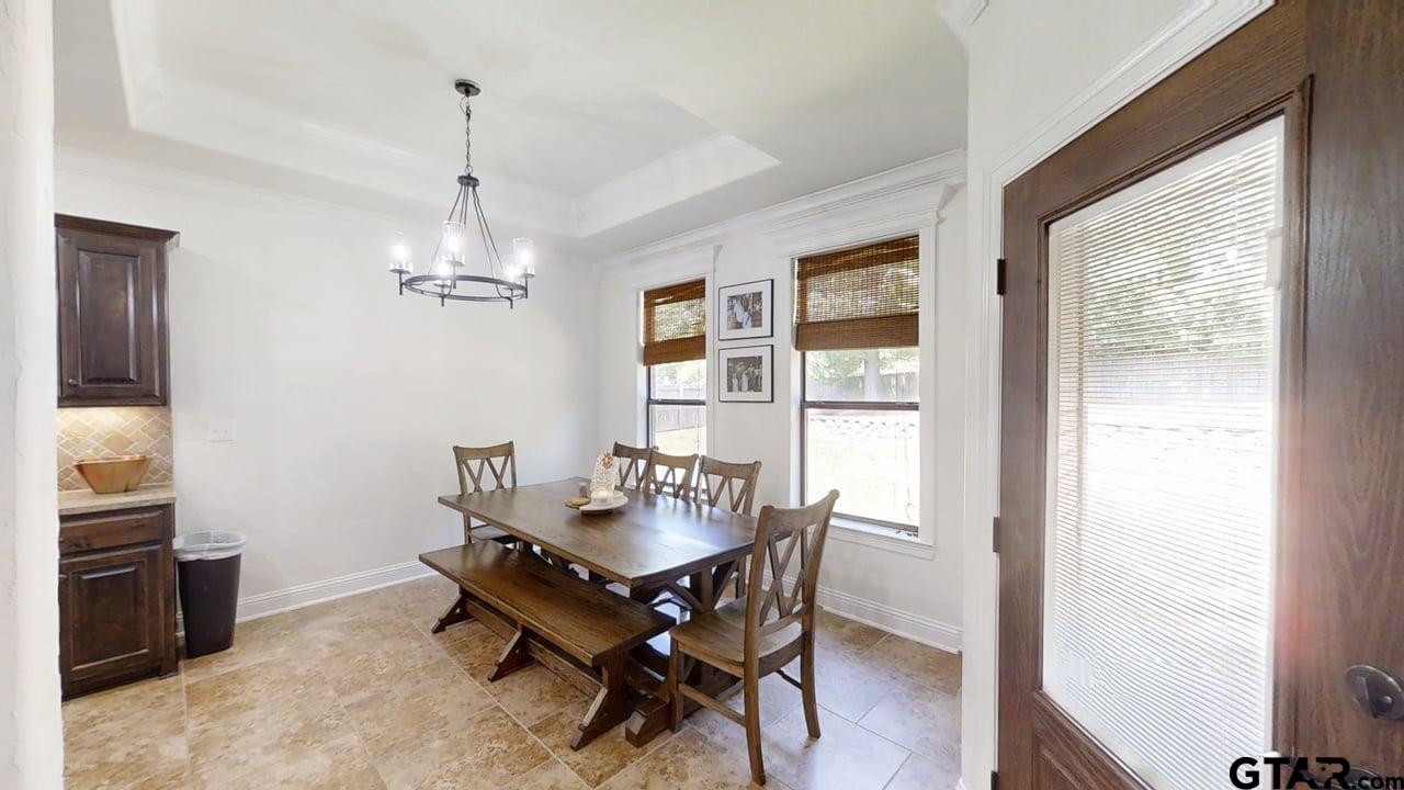 809 Crepe Myrtle Lane Longview, TX 75604 - Photo 8 of 39 a dining room with furniture and window
