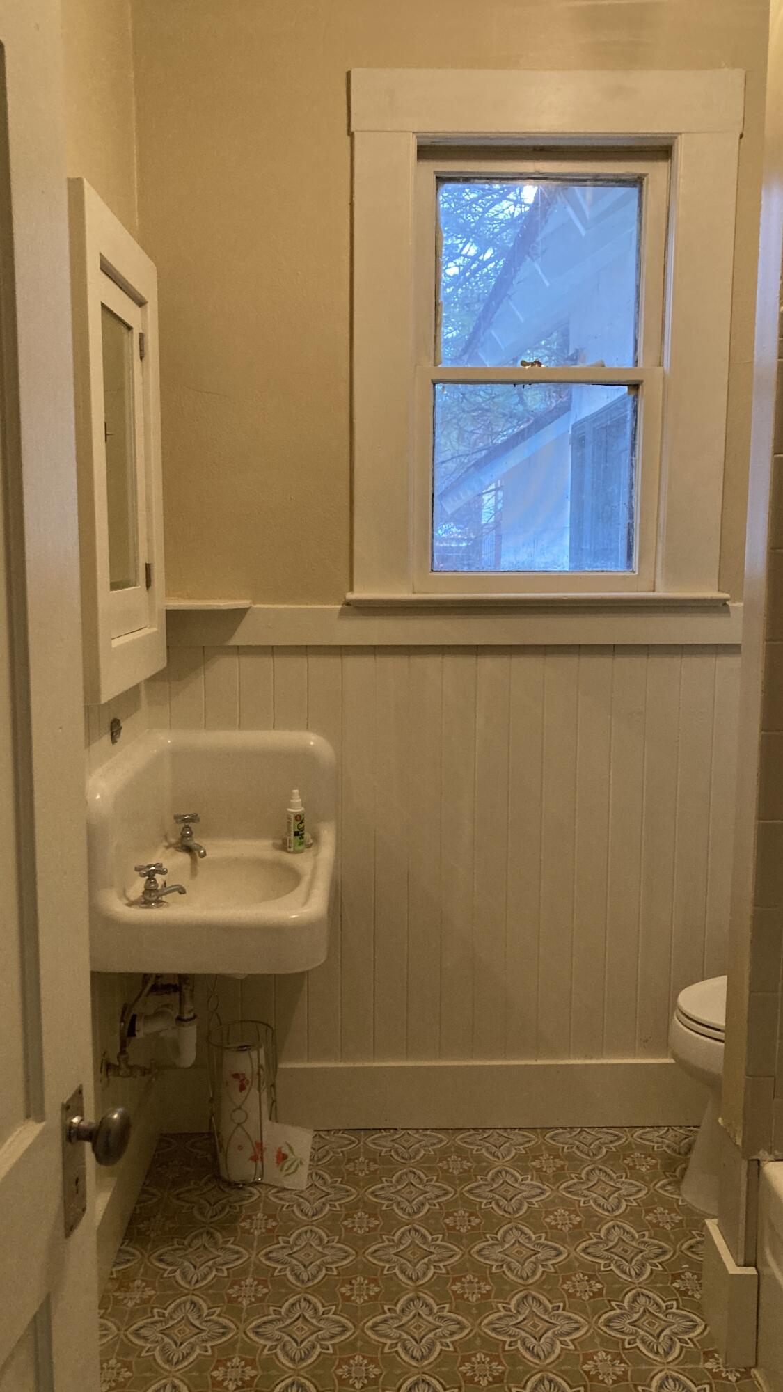 41008 Old School Road Fall River Mills, CA 96028 - Photo 27 of 53 a bathroom with a sink a toilet and mirror