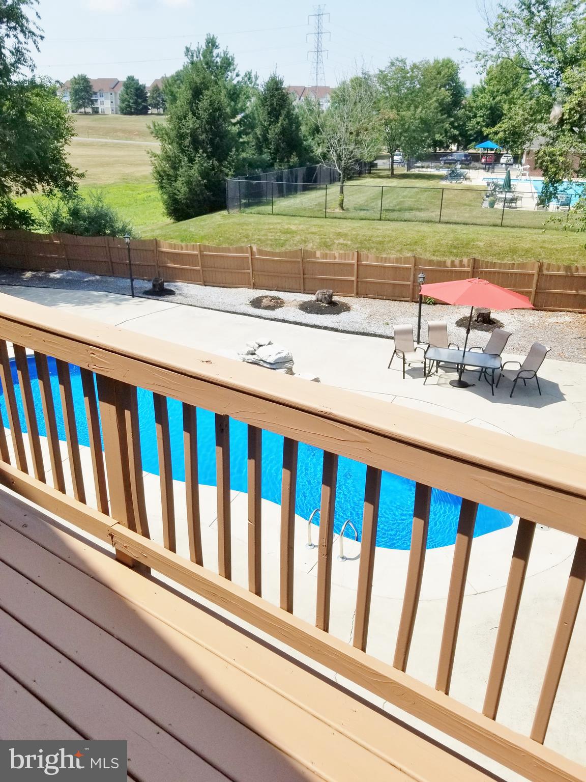 1818 Weybridge Road Frederick, MD 21702 - Photo 25 of 47 Mountain views and pool from Master bedroom deck