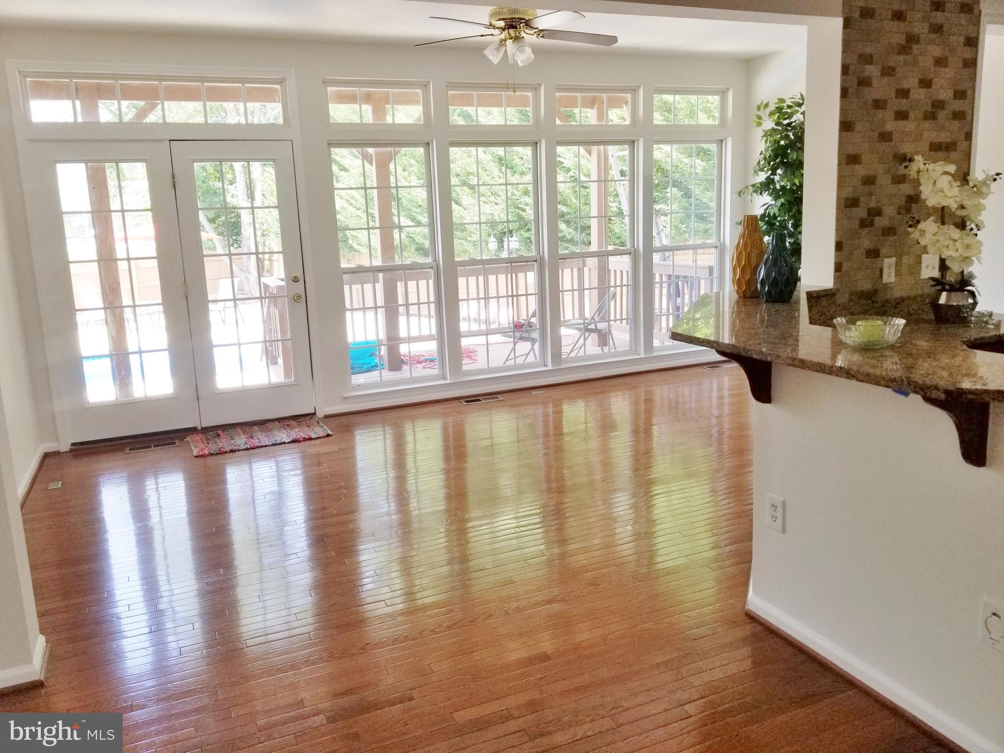 1818 Weybridge Road Frederick, MD 21702 - Photo 30 of 47 Morning room leads to pool thru double patio door