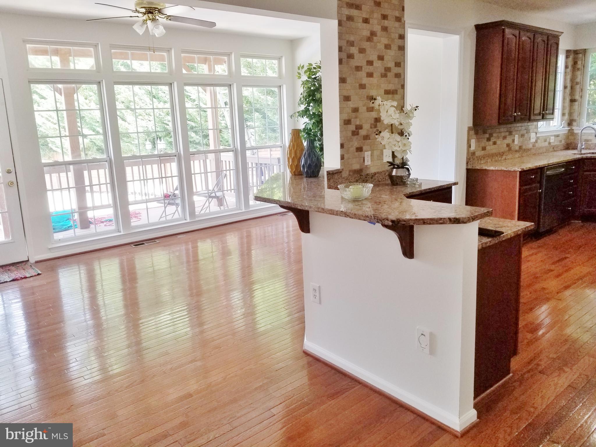 1818 Weybridge Road Frederick, MD 21702 - Photo 32 of 47 Morning/ Sun room could have private dining area