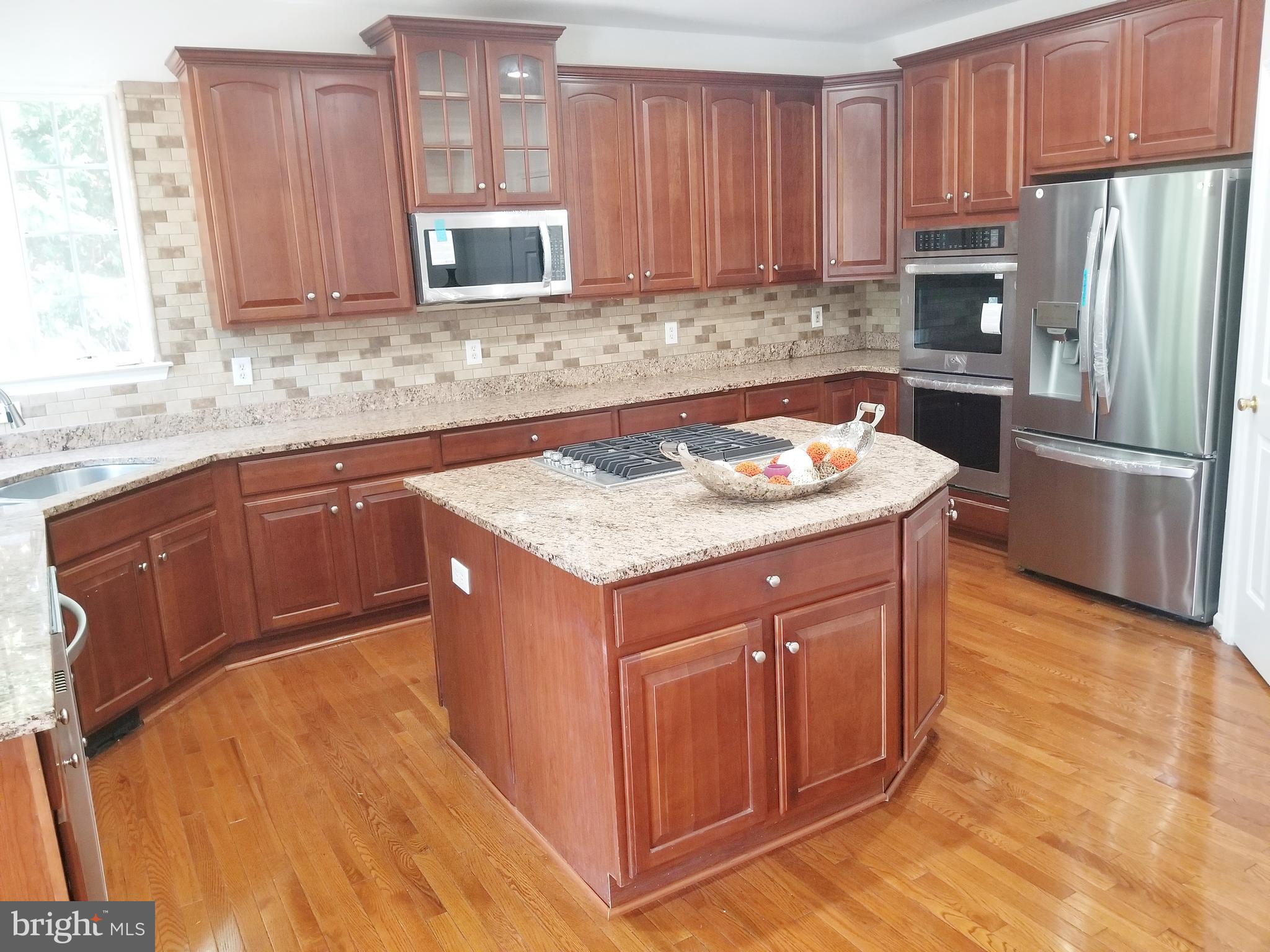 1818 Weybridge Road Frederick, MD 21702 - Photo 37 of 47 All new appliances. Kitchenaid gas cooktop